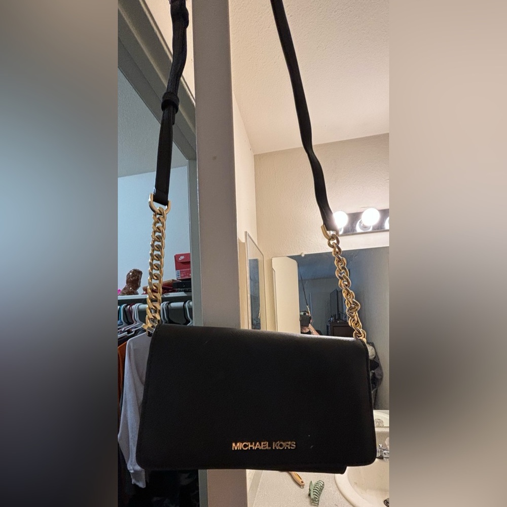 Michael Kors black clutch with strap